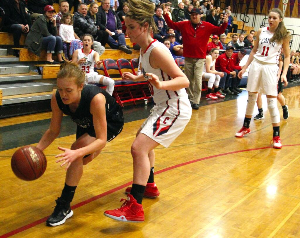 Sonoma's Emma Stanfield grabs a loose ball during the Friday, Feb. 26, NCS game against Campolindo. Campolindo won 72-41.Photos by Bill Hoban/Index-Tribune