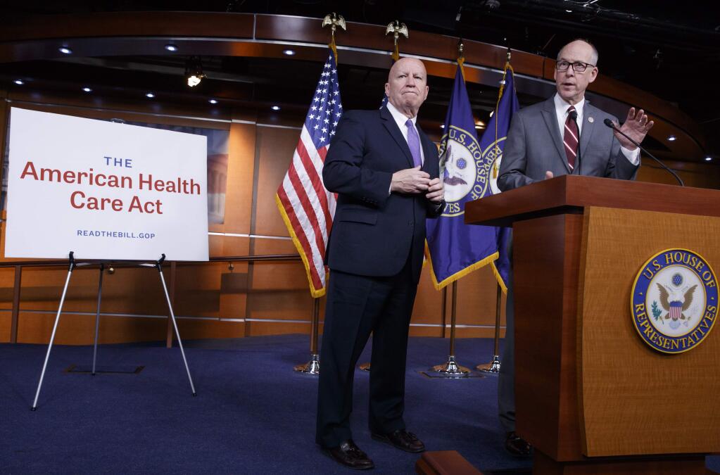 House Ways and Means Committee Chairman Rep. Kevin Brady, R-Texas, left, and House Energy and Commerce Committee Chairman Rep. Greg Walden, R-Ore., meet with reporters on Capitol Hill in Washington, Tuesday, March 7, 2017, as House Republicans introduce their plan to repeal and replace the Affordable Care Act. (AP Photo/J. Scott Applewhite)