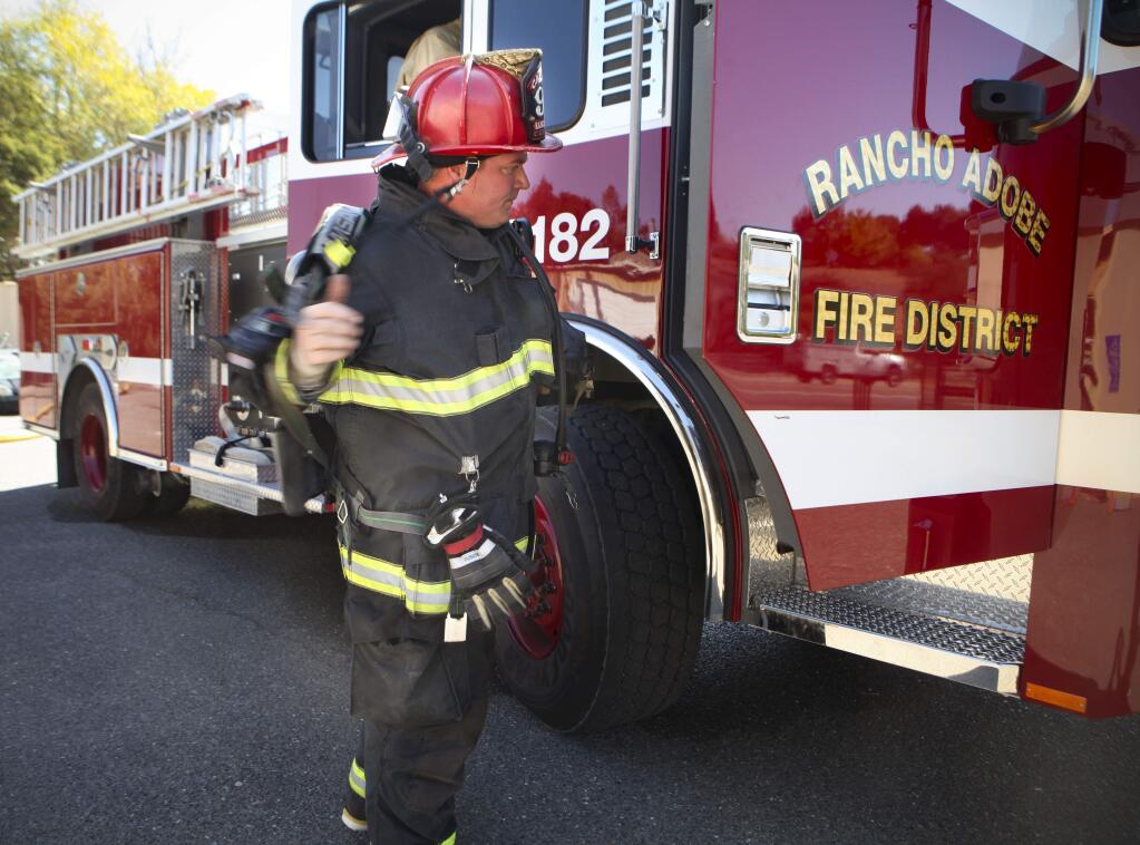 Captain James Deurloo of the Rancho Adobe Fire District trains at the station in Penngrove. A ballot measure to obtain more money for the Rancho Adobe Fire District is in the November ballot. (CRISTINA PASCUAL/ARGUS-COURIER STAFF)