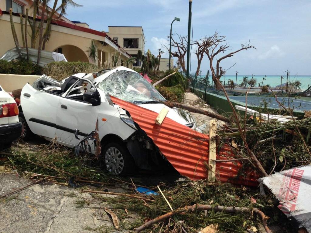 Cardinal Newman grad Matt Popovich is stranded on St. Maarten with his girlfriend as the island braces for Hurricane Jose to hit. Popovich shared photos on his Twitter account of missing roofs, flipped cars, stripped vegetation, green hills reduced to dirt and torn up tree trunks after Hurrican Irma hit, Thursday, Sept. 7, 2017. (TWITTER.COM/MPOPV)