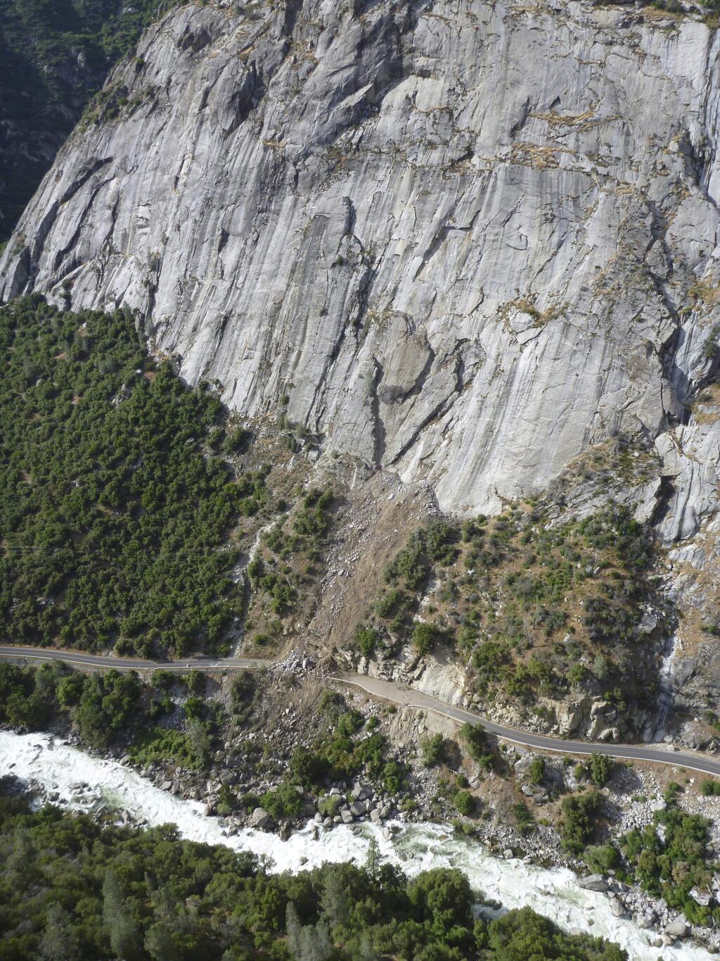 This Monday, June 12, 2017, photo provided by the National Park Service shows a rockslide that blocked one of the main roads into Yosemite National Park in California. About 4,000 tons (3,600 metric tons) of rock detached from a cliff on Monday, blocking El Portal Road, Park spokesman Scott Gediman. (NPS Photo via AP)