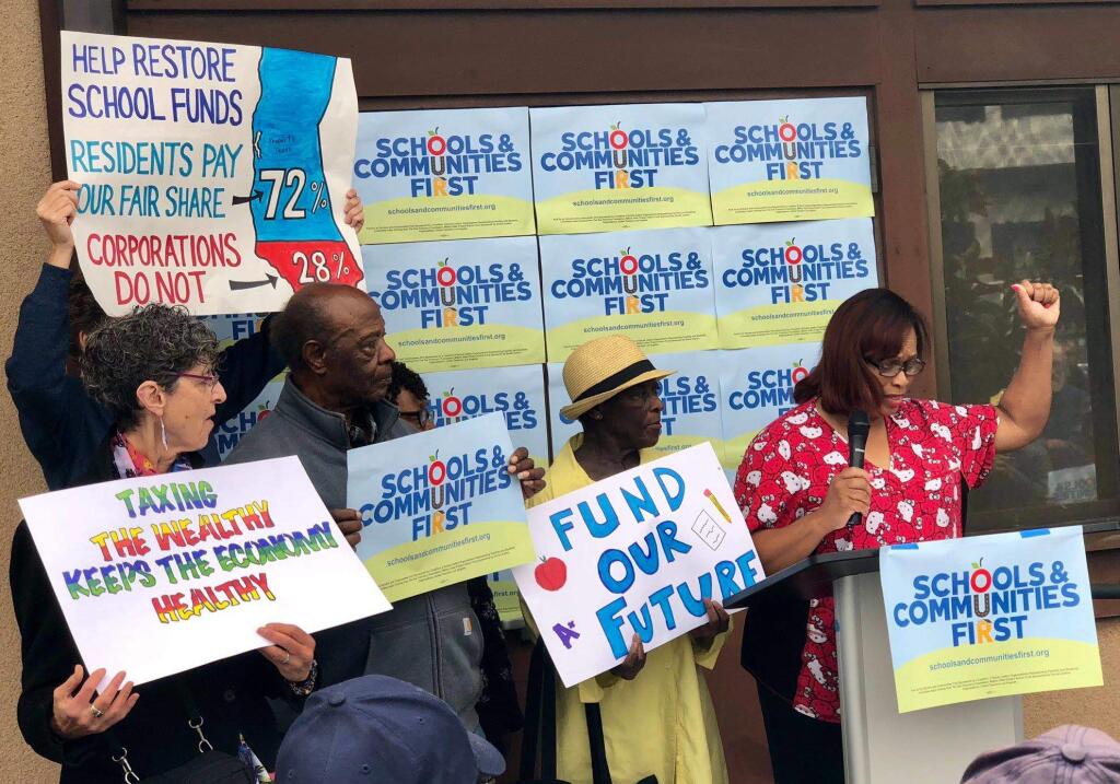 Schools & Communities First holds a rally in 2018 in support of a ballot initiative for a 'split roll' to treat commercial real estate differently in property taxes. The initiatives have until April 2020 to collect signatures to qualify for ballot that November. (Facebook)