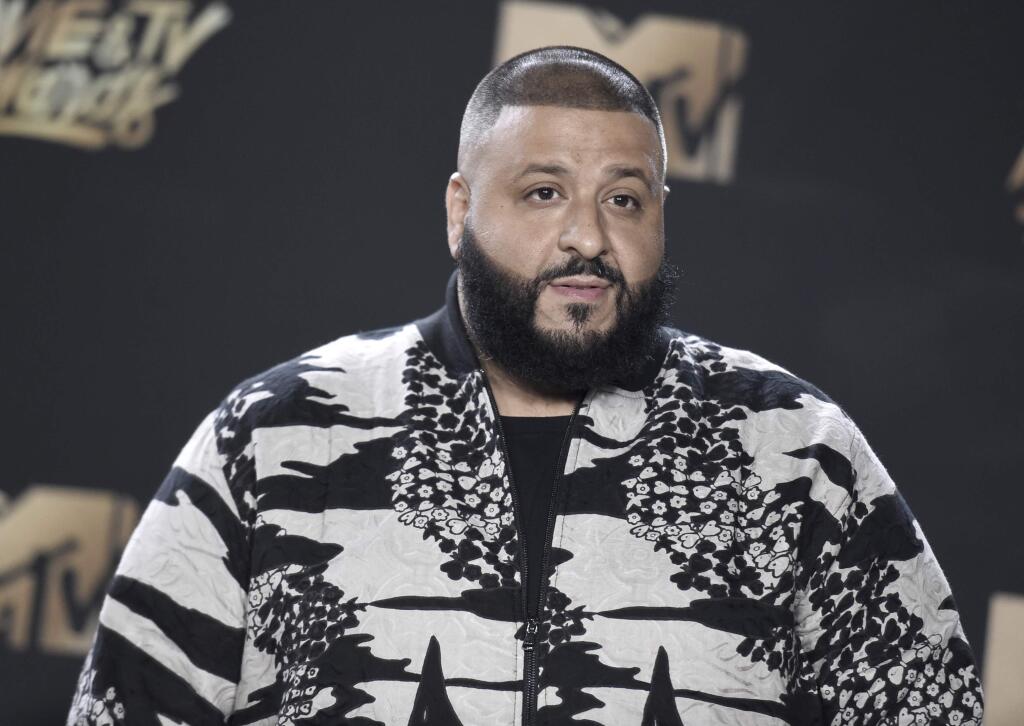 FILE - In this Sunday, May 7, 2017 file photo, DJ Khaled arrives at the MTV Movie and TV Awards at the Shrine Auditorium in Los Angeles. A group of future number-crunchers had their commencement crashed by DJ Khaled. The hip-hop star and social media celebrity gave a surprise performance at the ceremony Wednesday, May 17, 2017, for statistics graduates at the University of California, Berkeley. (Photo by Richard Shotwell/Invision/AP, File)