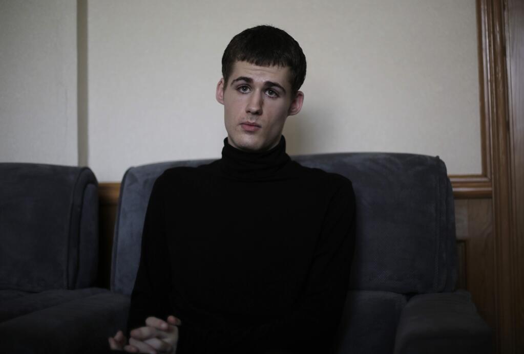Mathew Miller, an American detained in North Korea speaks to the Associated Press, Monday, Sept. 1, 2014 in Pyongyang, North Korea. North Korea has given foreign media access to three detained Americans who said they have been able to contact their families and watched by officials as they spoke, called for Washington to send a representative to negotiate for their freedom. (AP Photo/Wong Maye-E)