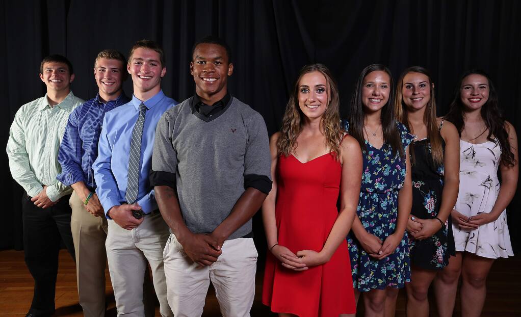 The 21st Annual All Empire Athletes of the Year winners, from left to right, Alex Gustafson, Alex Netherda, Jack Preston, Isazah King, Millie Unti, Hannah Sarlatte, Joelle Krist and Savannah Stoughton, at the Friedman Center in Santa Rosa, Wednesday, May 6, 2015. (Crista Jeremiason / The Press Democrat)