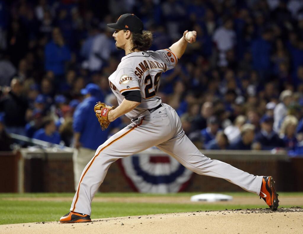 San Francisco Giants starting pitcher Jeff Samardzija (29) throws in the first inning of Game 2 of baseball's National League Division Series against the Chicago Cubs, Saturday, Oct. 8, 2016, in Chicago. (AP Photo/Nam Y. Huh)