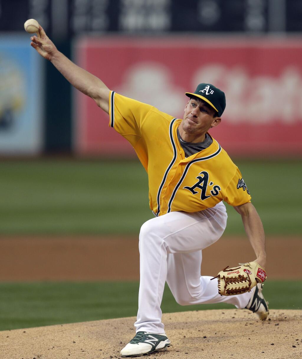 Oakland Athletics pitcher Chris Bassitt works against the Cleveland Indians in the first inning of a baseball game Thursday, July 30, 2015, in Oakland, Calif. (AP Photo/Ben Margot)