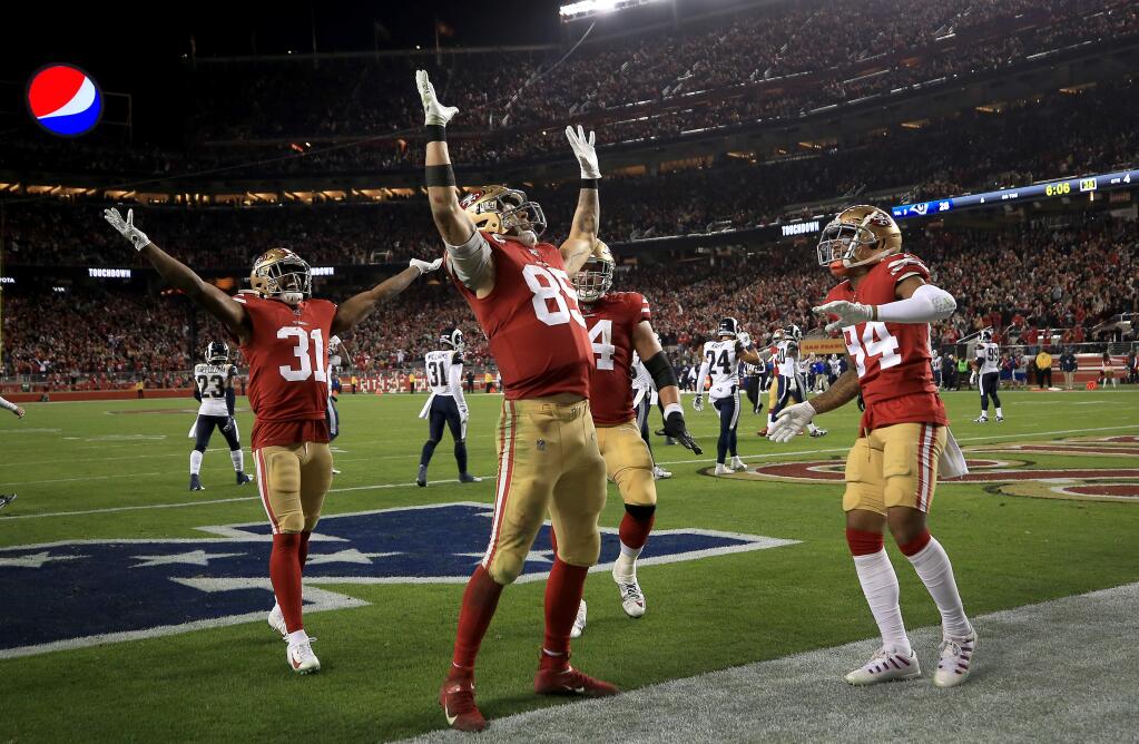 George Kittle (85) celebrates his fourth-quarter touchdown against the Rams during San Francisco's 34-31 win over Los Angeles, Saturday, Dec. 21, 2019 in Santa Clara. (Kent Porter / The Press Democrat) 2019