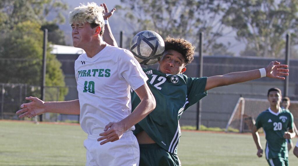 Bill Hoban/Index-TribuneSonoma's Christian Prudente (#12) attempts a header during Wednesday's North Coast Section opening round game against Drake. The Dragons won 3-1 and will face top-seeded Miramonte on Saturday.