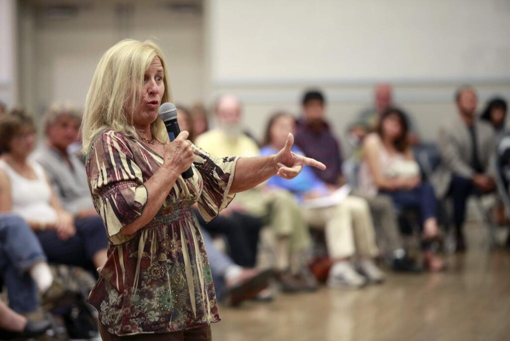 Marcia Shaw complains about brutality used by the Sonoma County Sheriff's Office during a listening session held by a community task force created by the Sonoma County Board of Supervisors at the Veterans Memorial Building in Santa Rosa, on Thursday, July 10, 2014. (BETH SCHLANKER/ The Press Democrat)