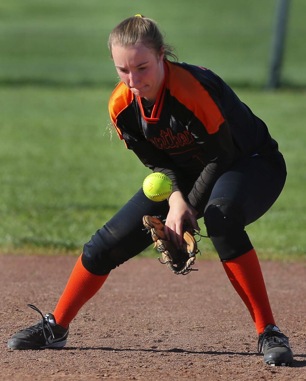 Santa Rosa's Briana Ririe bobbles a grounder against Windsor, in Windsor, on Tuesday, March 29, 2016. (Christopher Chung/ The Press Democrat)