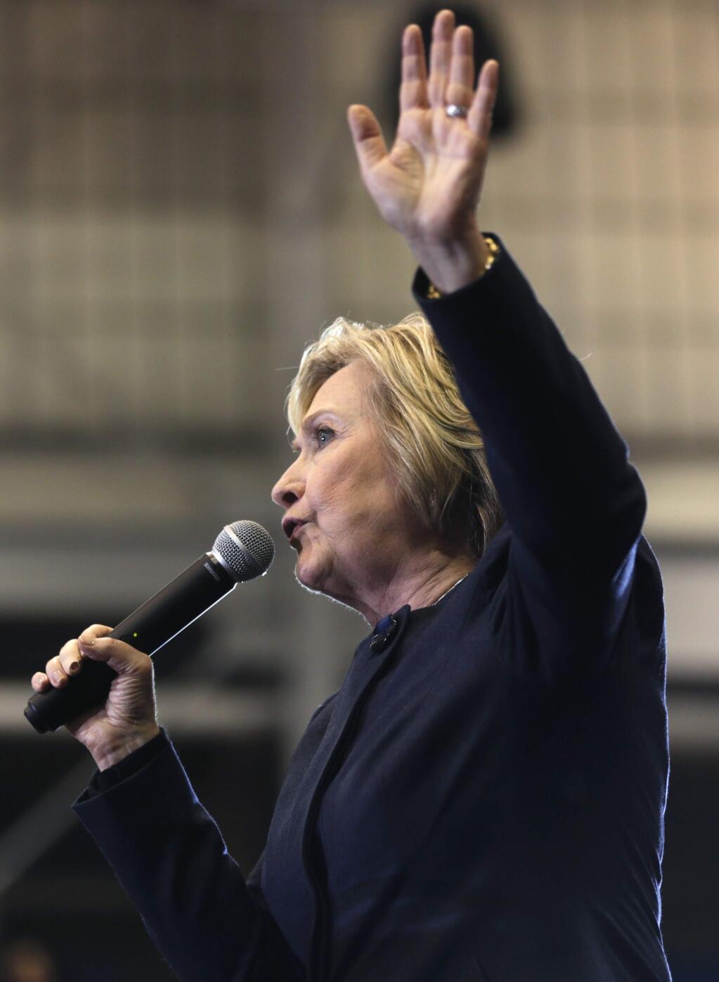 Democratic presidential candidate Hillary Clinton speaks during a rally at Cohoes High School on Monday, April 4, 2016, in Cohoes, N.Y. (AP Photo/Mike Groll)