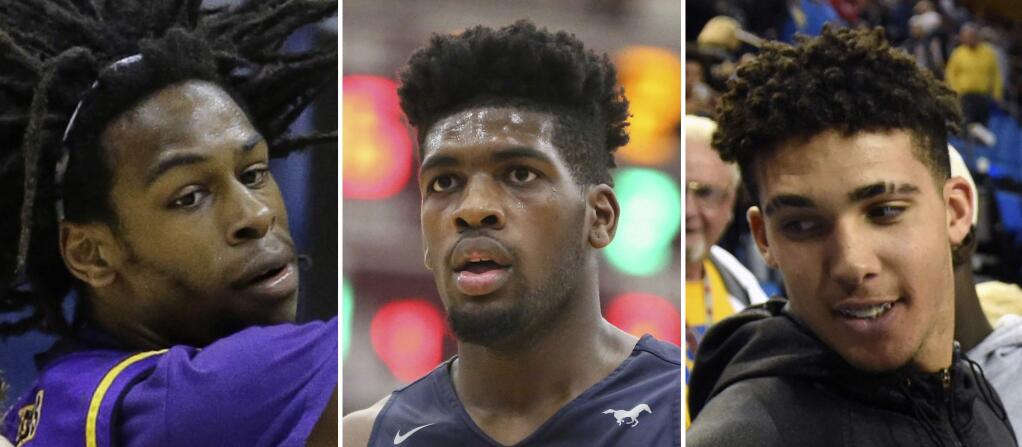 At left, in a March 10, 2016, file photo, Aransas Pass high school basketball player Jalen Hill is shown during a state semifinal basketball game in San Antonio. At center, in a Jan. 16, 2017, file photo, Sierra Canyon's Cody Riley is shown during a high school basketball game in Springfield, Mass. At right, in a Nov. 20, 2016, file photo, LiAngelo Ball is shown in Los Angeles. (AP Photo/File)