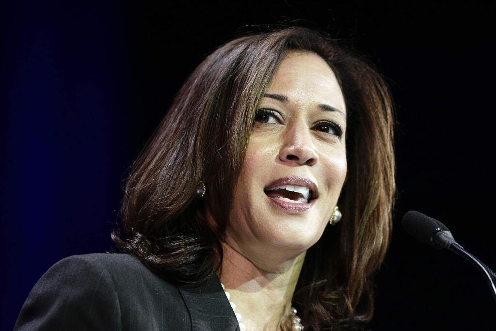 FILE - In this March 8, 2014, file photo, California Attorney General Kamala Harris speaks during a general session at the California Democrats State Convention in Los Angeles. Barbara Boxer announced Thursday, Jan. 8, 2015, that she will not seek re-election in 2016. An adviser with knowledge of her plans says California Attorney General Kamala Harris will announce Tuesday, Jan. 13, 2015 that she will seek the U.S. Senate seat being vacated by Sen. Barbara Boxer. (AP Photo/Jae C. Hong, File)