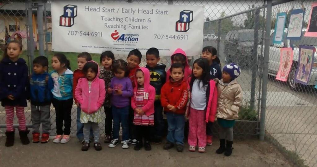 A group of Head Start students sing 'The Itsy Bitsy Spider.' The classrooms used for Head Start are closing Wednesday, to make room for a new high school. (Screengrab from video by Jamie Hansen / The Press Democrat)