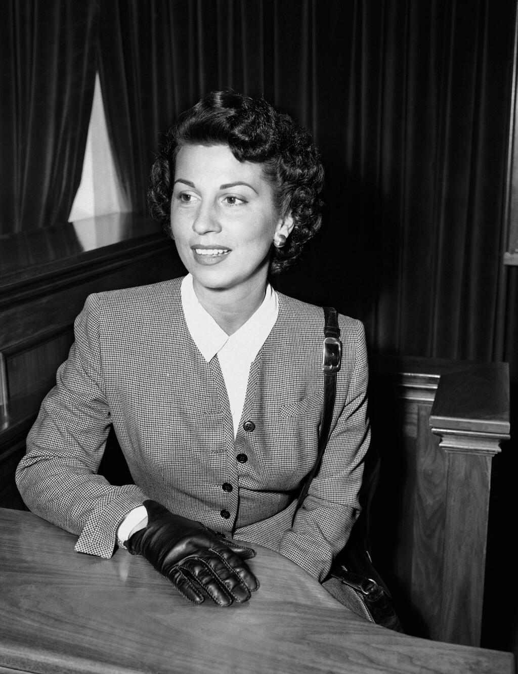 FILE - In this Sept. 28, 1950 file photo, Nancy Sinatra Sr. takes the witness stand in Superior Court in Santa Monica, Calif., where she was granted a decree of separate maintenance from singer Frank Sinatra. Sinatra Sr., the childhood sweetheart of Frank Sinatra who became the first of his four wives and the mother of his three children, has died. She was 101. Her daughter, Nancy Sinatra Jr., tweeted that her mother died Friday, July 13, 2018. (AP Photo/Harold Filan, File)