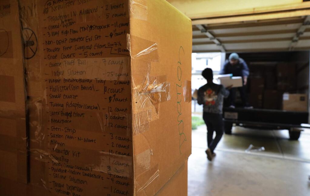 Medical supplies are listed on the side of a box to be shipped to Eritrea, by Tomas Tesfasilassie's nonprofit Supply the Change, in Santa Rosa on Wednesday, January 24, 2018. (Christopher Chung/ The Press Democrat)