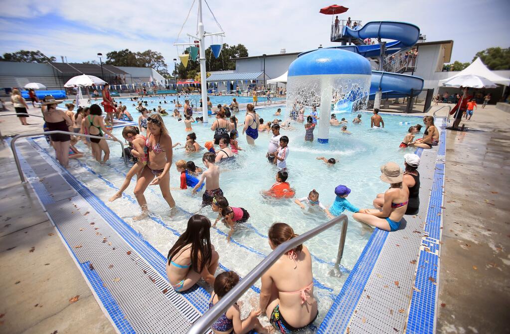 Take a dip in the semi-crowded Ridgeway Pool in Santa Rosa. (Kent Porter / Press Democrat) 2015