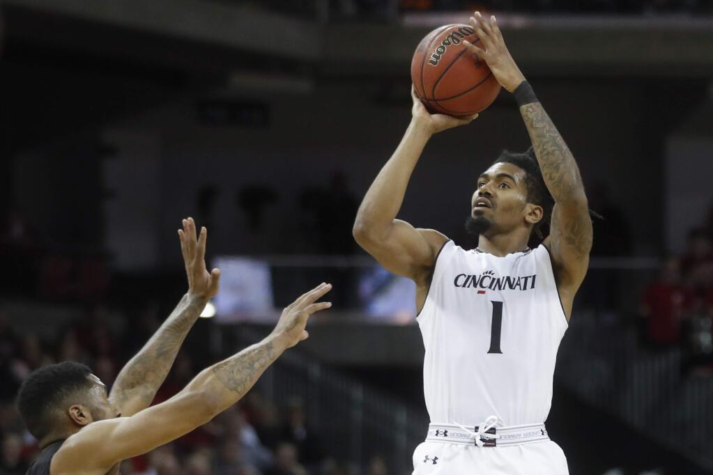In this Feb. 6, 2018, file photo, Cincinnati's Jacob Evans shoots in the first half of against Central Florida, in Highland Heights, Ky. (AP Photo/John Minchillo, File)