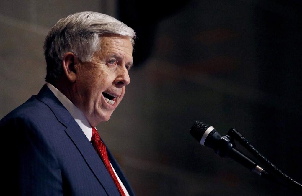 FILE - In this Jan. 16, 2019, file photo, Missouri Gov. Mike Parson delivers his State of the State address in Jefferson City, Mo. Missouri's Republican-led Legislature has passed a sweeping bill to ban abortions at eight weeks of pregnancy, and Republican Gov. Parson is expected to sign it. The House approved the measure Friday May 17, 2019. (AP Photo/Charlie Riedel, File)
