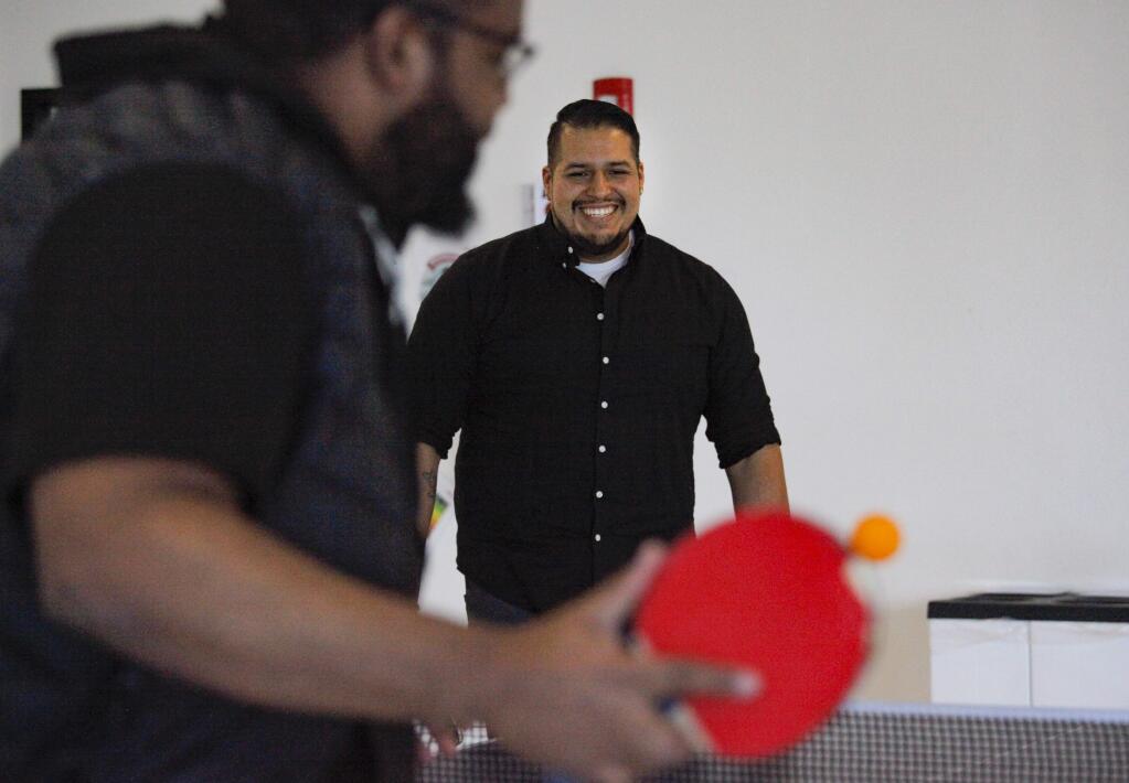 Petaluma, CA, USA._Tuesday, March 26, 2019. (Left to right) Simon Yohannes and Jonathan Arrospide enjoy playing ping pong during their break at Workrite Ergonomics. The Petaluma-based company provides several wellness opportunities to their employees. They will be participating in Petaluma Walking Day at Shollenberger Park on April 3rd. (CRISSY PASCUAL/ARGUS-COURIER STAFF)
