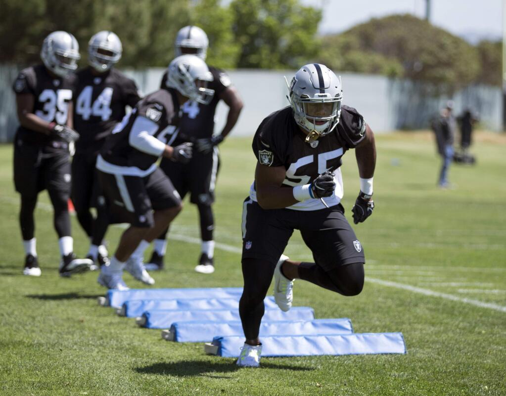 Oakland Raiders linebacker Marquel Lee (55) runs a drill during NFL football rookie minicamp, Friday, May 5, 2017, at Raiders headquarters in Alameda, Calif. (AP Photo/D. Ross Cameron)