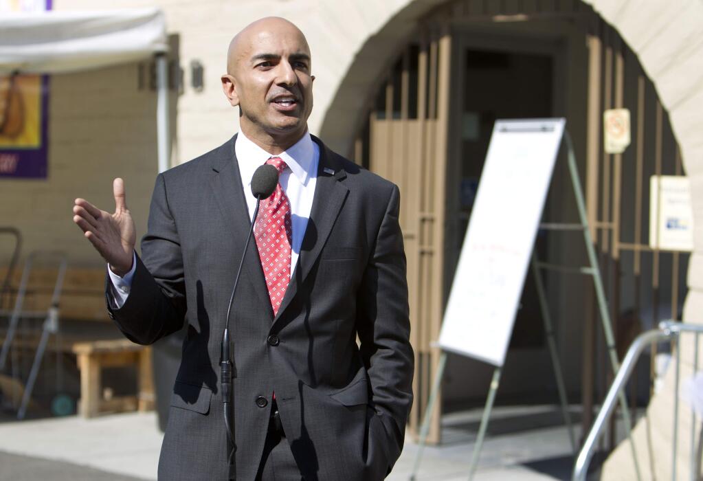 Republican candidate for governor Neel Kashkari discusses issues related to poverty in California during a news conference outside of the River City Food Bank in Sacramento, Calif., on Thursday, July 31, 2014. Kashkari said he spent a week living as a homeless person in search of a job to test Gov. Jerry Brown's claim that the state is making a comeback after the economic downturn. A video crew documented his week. (AP Photo/Steve Yeater)
