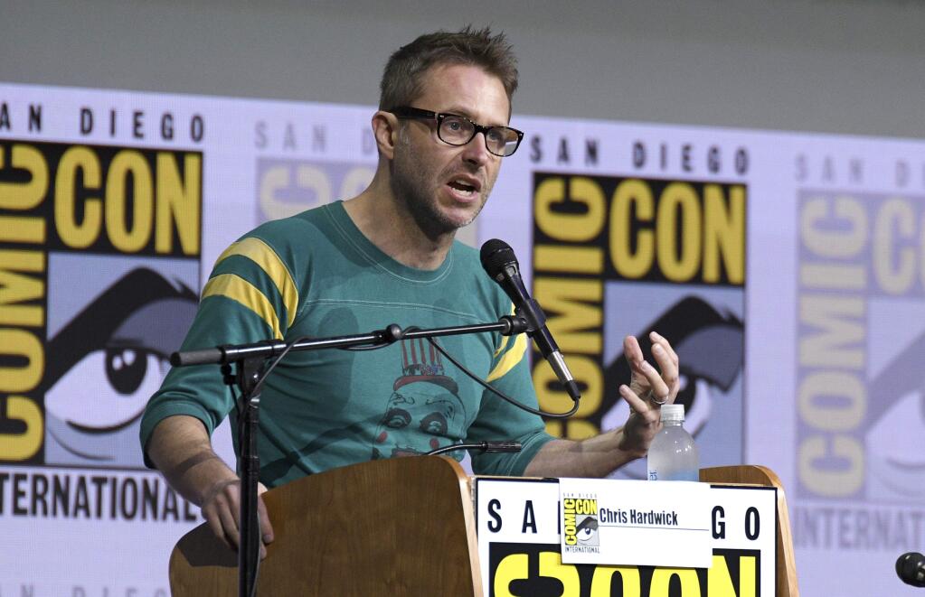 FILE - In this July 21, 2017 file photo, Chris Hardwick moderates the 'Fear The Walking Dead' panel at Comic-Con International in San Diego. Hardwick, a mainstay at Comic-Con and moderator of numerous panels, stepped aside from moderating AMC and BBC America panels amid allegations from an ex-girlfriend, which Hardwick has denied. (Photo by Al Powers/Invision/AP, File)