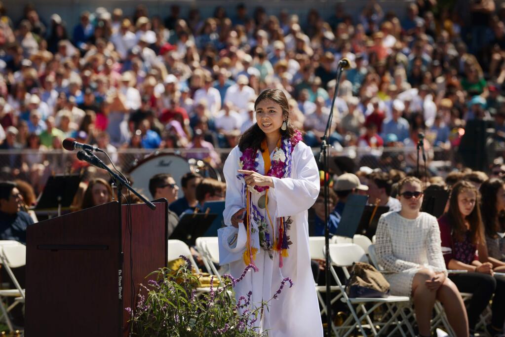Lulabel Seitz demanding her microphone to be turned back on after it was shut off abruptly during her valedictorian speech at the Petaluma High School Graduation ceremony held Saturday in Petaluma, California. June 2, 2018.(Photo: Erik Castro/for The Press Democrat)
