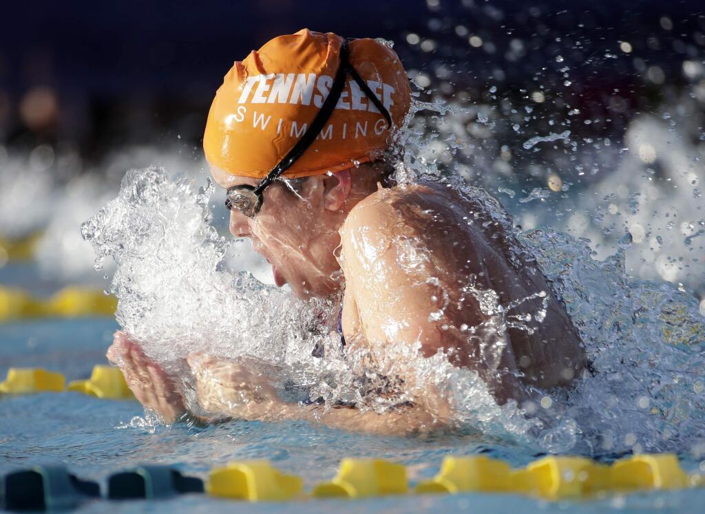 Molly Hannis competes in the 200-meter breaststroke final during the Arena Pro Swim Series swim meet, Friday, April 15, 2016, in Mesa, Ariz. (AP Photo/Matt York)