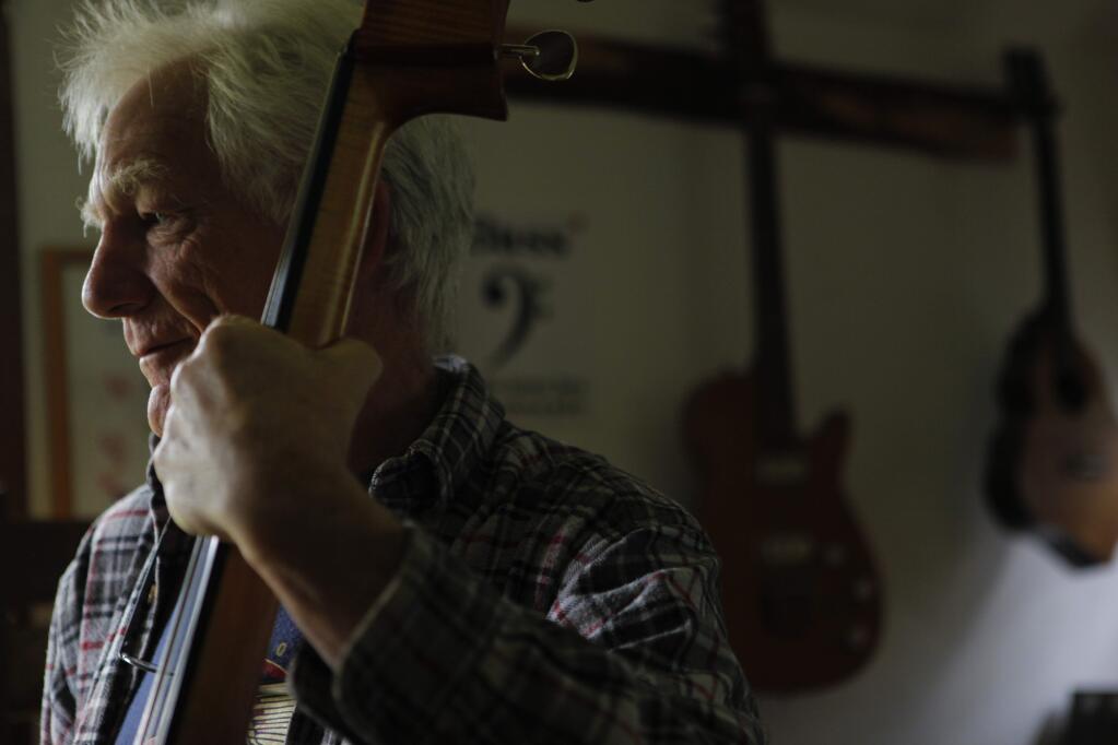 Local luthier, Bruce Sexauer creates handmade stringed instruments in his Petaluma workshop. He is President of the Northern California Association of Luthiers. (CRISSY PASCUAL/ARGUS-COURIER STAFF)