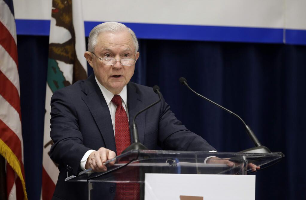 U.S. Attorney General Jeff Sessions addresses the California Peace Officers' Association at the 26th Annual Law Enforcement Legislative Day, Wednesday, March 7, 2018, in Sacramento, Calif. Sessions told law enforcement officers at the conference Wednesday that the Justice Department sued California because state laws are preventing federal immigration agents from doing their jobs. (AP Photo/Rich Pedroncelli)