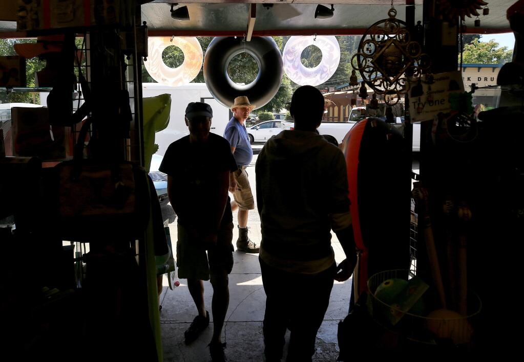 Tourists shop at the Guerneville 5 & 10, Friday, August 30, 2019. (Kent Porter / The Press Democrat) 2019