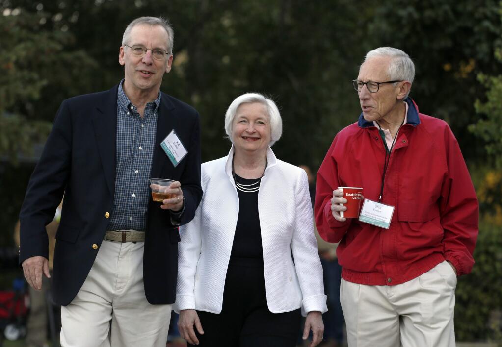 Federal Reserve Chair Janet Yellen, center, strolls with Stanley Fischer, right, vice chairman of the Board of Governors of the Federal Reserve System, and Bill Dudley, the president of the Federal Reserve Bank of New York, before her speech to the annual invitation-only conference of central bankers from around the world, at Jackson Lake Lodge in Grand Teton National Park, north of Jackson Hole, Wyo., Friday, Aug 26, 2016. (AP Photo/Brennan Linsley)