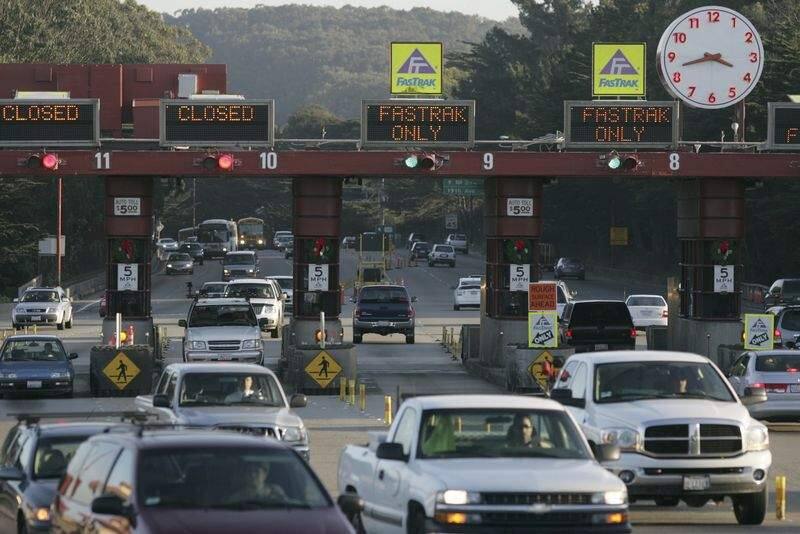 Drivers travel north through the toll booths from Doyle Drive in San Francisco before crossing the Golden Gate Bridge. (Kent Porter/The Press Democrat file)