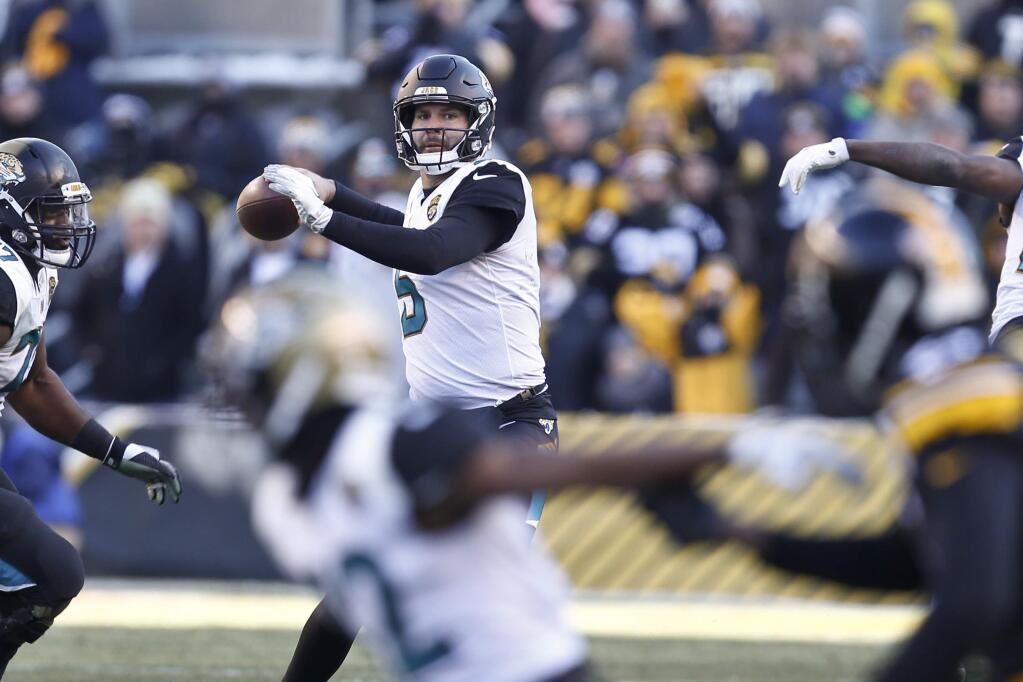 Jacksonville Jaguars quarterback Blake Bortles throws against the Pittsburgh Steelers, Sunday, Jan. 14, 2018, in Pittsburgh. (AP Photo/Keith Srakocic)