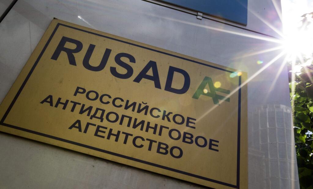 FILE -The May 24, 2016 file photo shows a RUSADA sign reading 'Russian National Anti-doping Agency' on a building in Moscow, Russia. The World Anti-Doping Agency is due to vote Thursday Sept. 20, 2018, on possible reinstatement of Russia's anti-doping agency, RUSADA, but opponents feel Russia can't be trusted to reform without first accepting more of the blame. (AP Photo/Alexander Zemlianichenko, FILE)