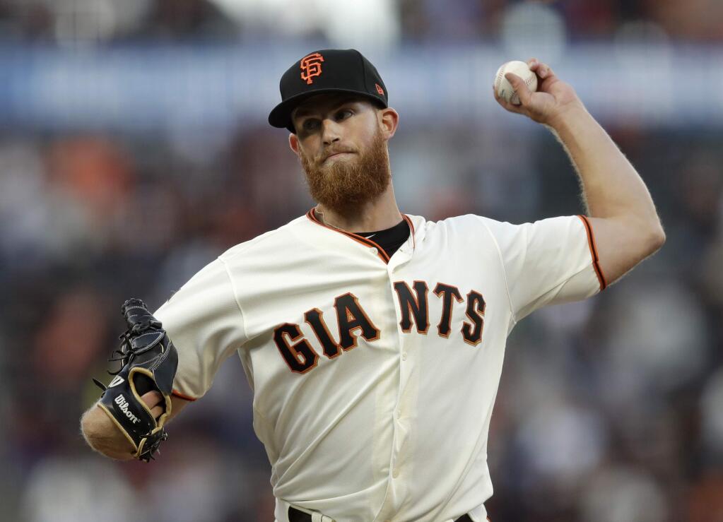 San Francisco Giants pitcher Conner Menez works against the Washington Nationals during the first inning of a baseball game Tuesday, Aug. 6, 2019, in San Francisco. (AP Photo/Ben Margot)