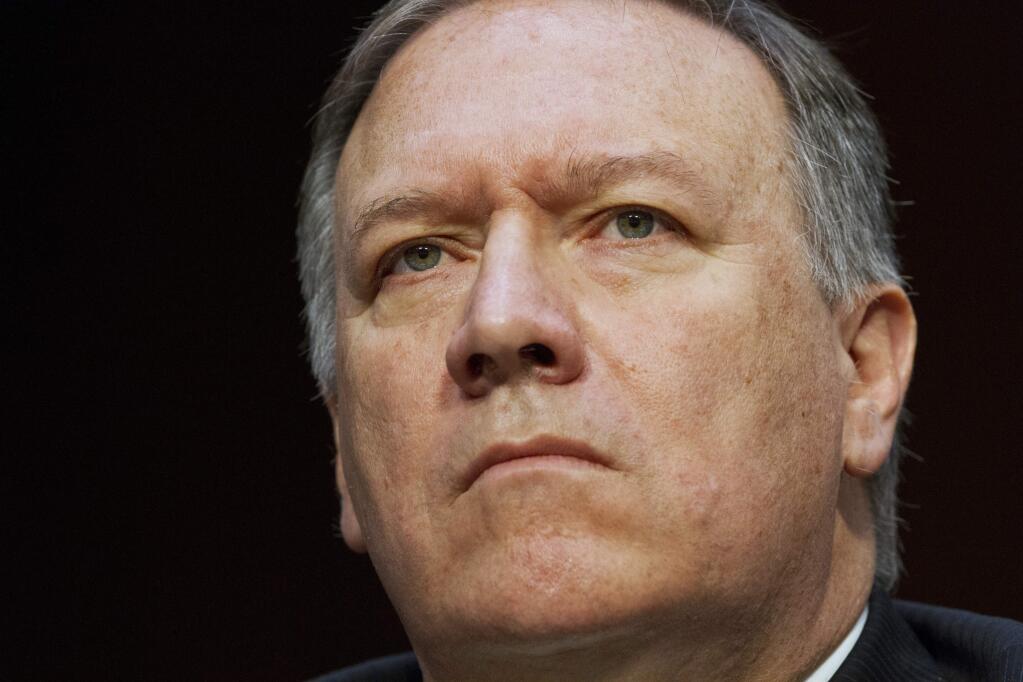 FILE - In the May 11, 2017 file photo, CIA Director Mike Pompeo listens while testifying on Capitol Hill in Washington. Trump ousted Rex Tillerson as secretary of state Tuesday, making a surprise Twitter announcement that he's naming CIA director Mike Pompeo to replace him. (AP Photo/Jacquelyn Martin, File)