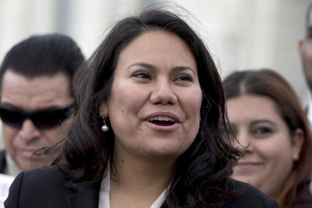 FILE - In this Feb. 27, 2013 file photo, El Paso, Texas, County Judge Veronica Escobar speaks during a news conference on Capitol Hill in Washington. Escobar, a Democratic Congressional candidate, faces Republican Rick Seeberger and independent candidate Ben Mendoza in the Nov. 6 election. (AP Photo/Carolyn Kaster, File)