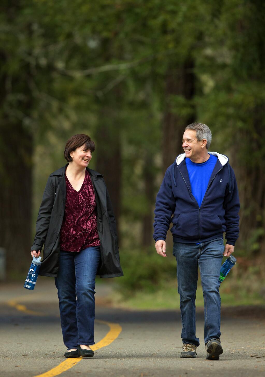Taunya Moore, left, of Cotati resolved years ago to donate a kidney to someone whose life or quality of life depended on a transplant. Richard Lazovick of Santa Rosa was the recipient in January and walks around Spring Lake to regain his strength. (photo by John Burgess/The Press Democrat)