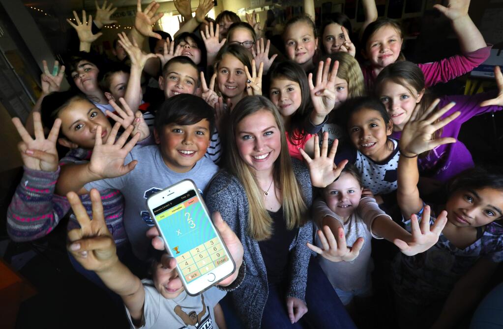 Santa Rosa High School student Mia Johansson was named a winner in the Congressional App Challenge for her app that helps elementary students learn their multiplication tables. She demonstrated her app Tuesday to Proctor Terrace Elementary School students. (John Burgess/The Press Democrat)