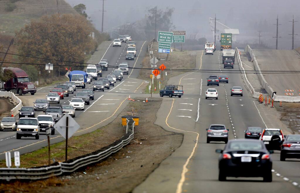 Vehicles travel along Highway 101, just south of the Petaluma Blvd S exit, in Petaluma, on Wednesday, December 9, 2015. (BETH SCHLANKER/ The Press Democrat)