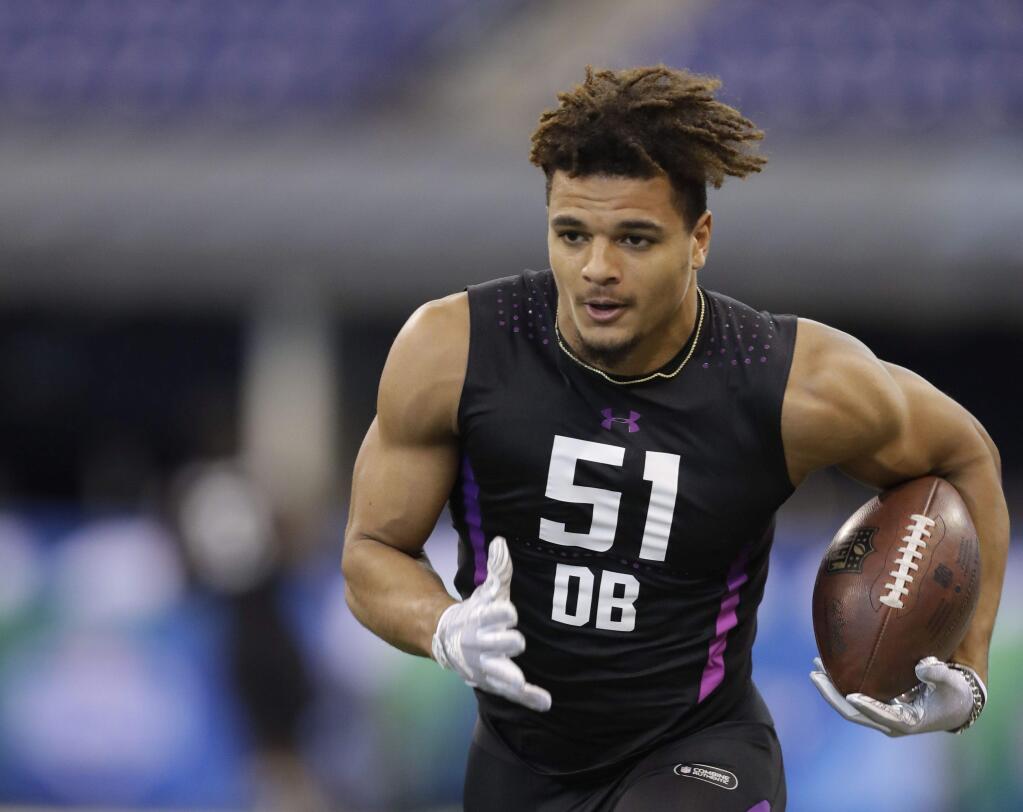 Alabama defensive back Minkah Fitzpatrick runs a drill during the NFL football scouting combine, Monday, March 5, 2018, in Indianapolis. (AP Photo/Darron Cummings)
