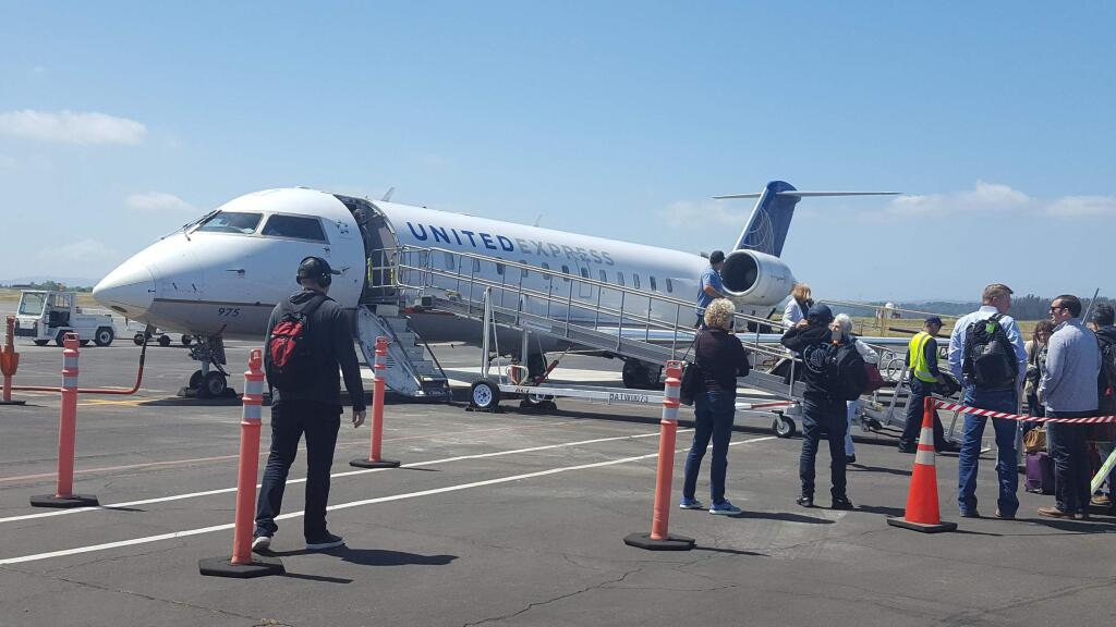 Passengers exit a United Express jet at Sonoma County Airport in Santa Rosa on April 30, 2019. (Sonoma County Airport)
