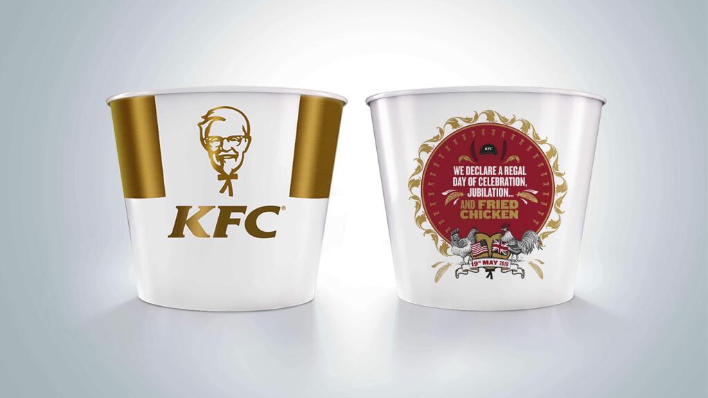 This is an undated handout photo issued by KFC of their limited edition commemorative bucket to celebrate the Royal Wedding of Prince Harry and Meghan Markle. The royal wedding smorgasbord of merchandise includes Harry and Meghan Marmite, Royal Wedding ale, Wedding Rings cereal and a limited-edition bucket of royal wedding KFC chicken. That's just a smattering of the millions of dollars' worth of souvenirs being sold to commemorate Prince Harry's marriage to Meghan Markle. Estimates are that consumers will spend 40 million to 70 million pounds ($54 million to $94 million) on royal wedding-related merchandise. (KFC via AP)