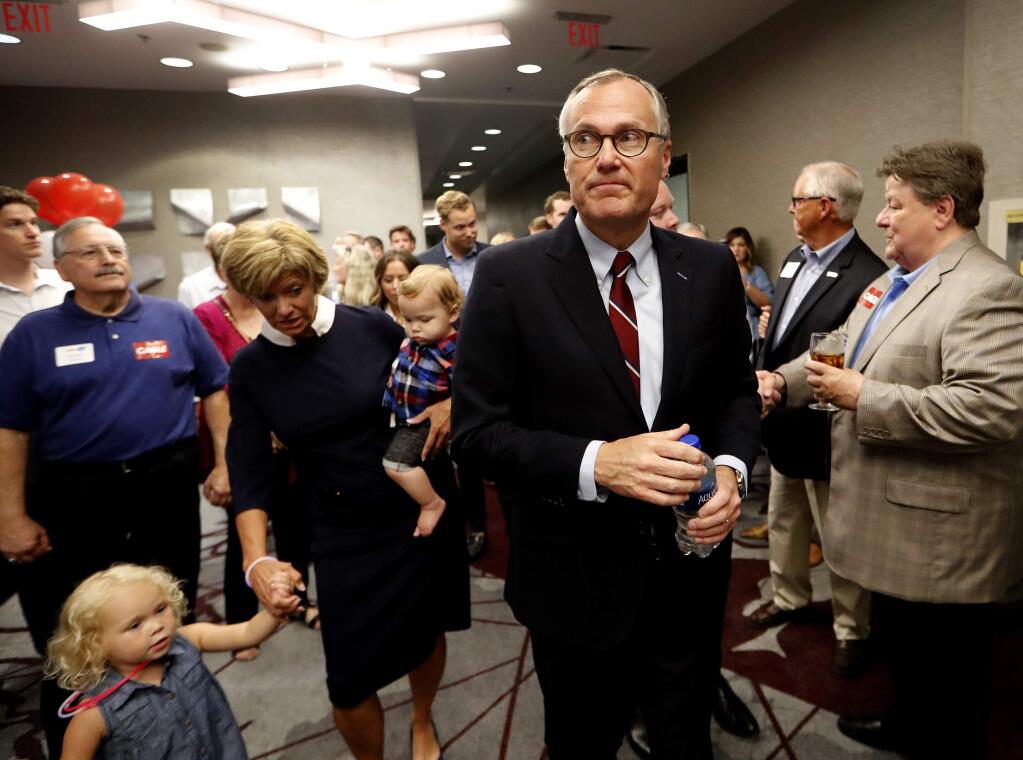 Georgia Republican gubernatorial candidate Lt. Gov. Casey Cagle makes his way to stage before speaking during his election-night watch party, Tuesday, July 24, 2018, in Atlanta. Cagle is in a runoff with Secretary of State Brian Kemp for the Republican nomination. (AP Photo/John Bazemore)