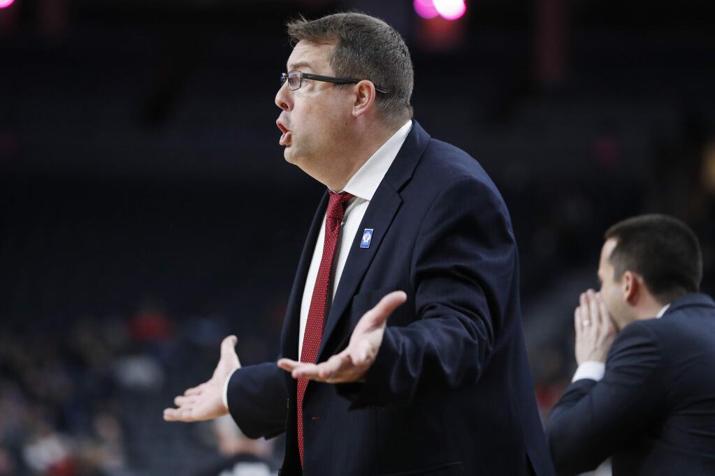 Stanford head coach Jerod Haase motions towards the court during the second half of an NCAA college basketball game against California in the first round of the Pac-12 men's tournament Wednesday, March 11, 2020, in Las Vegas. (AP Photo/John Locher)
