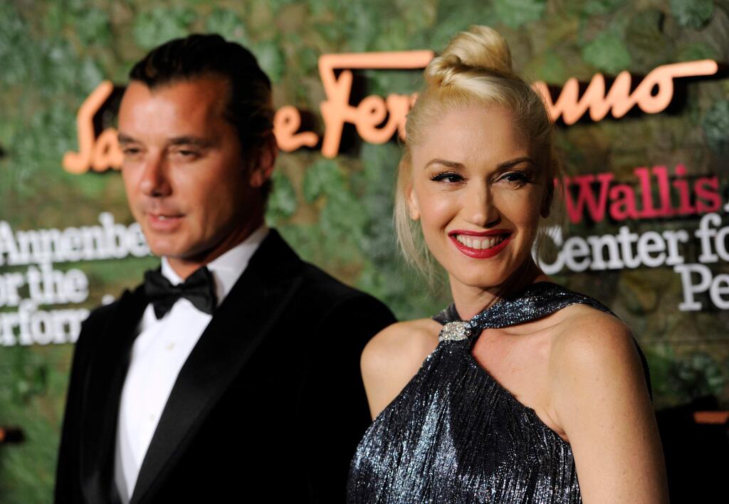 FILE - In this Oct. 17, 2013 file photo, Gavin Rossdale, left, and Gwen Stefani arrive at the Wallis Annenberg Center for the Performing Arts Inaugural Gala in Beverly Hills, Calif. Stefani filed for divorce Monday, Aug. 3, 2015, in Los Angeles, from Rossdale, citing irreconcilable differences. Both parties are seeking joint custody of their children. (Photo by Chris Pizzello/Invision/AP, File)