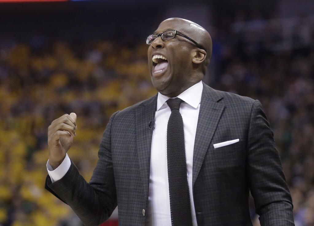 Golden State Warriors interim head coach Mike Brown shouts to his team in the first half during Game 4 of their second-round playoff series against the Utah Jazz Monday, May 8, 2017, in Salt Lake City. (AP Photo/Rick Bowmer)